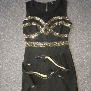 Black and gold sequined mini dress with mesh top